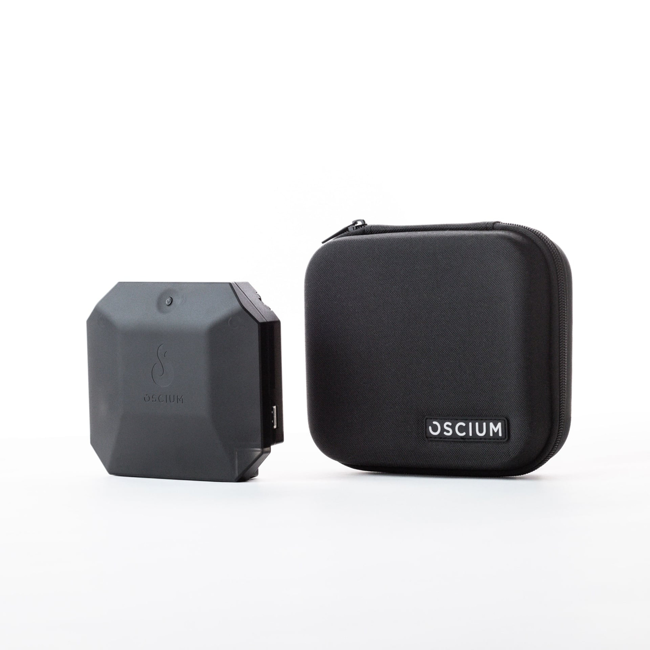 Oscium Nomad wearable Wi‑Fi measurement device with four‑radio 802.11ax/802.11be capability shown beside its black protective carrying case on a white background.